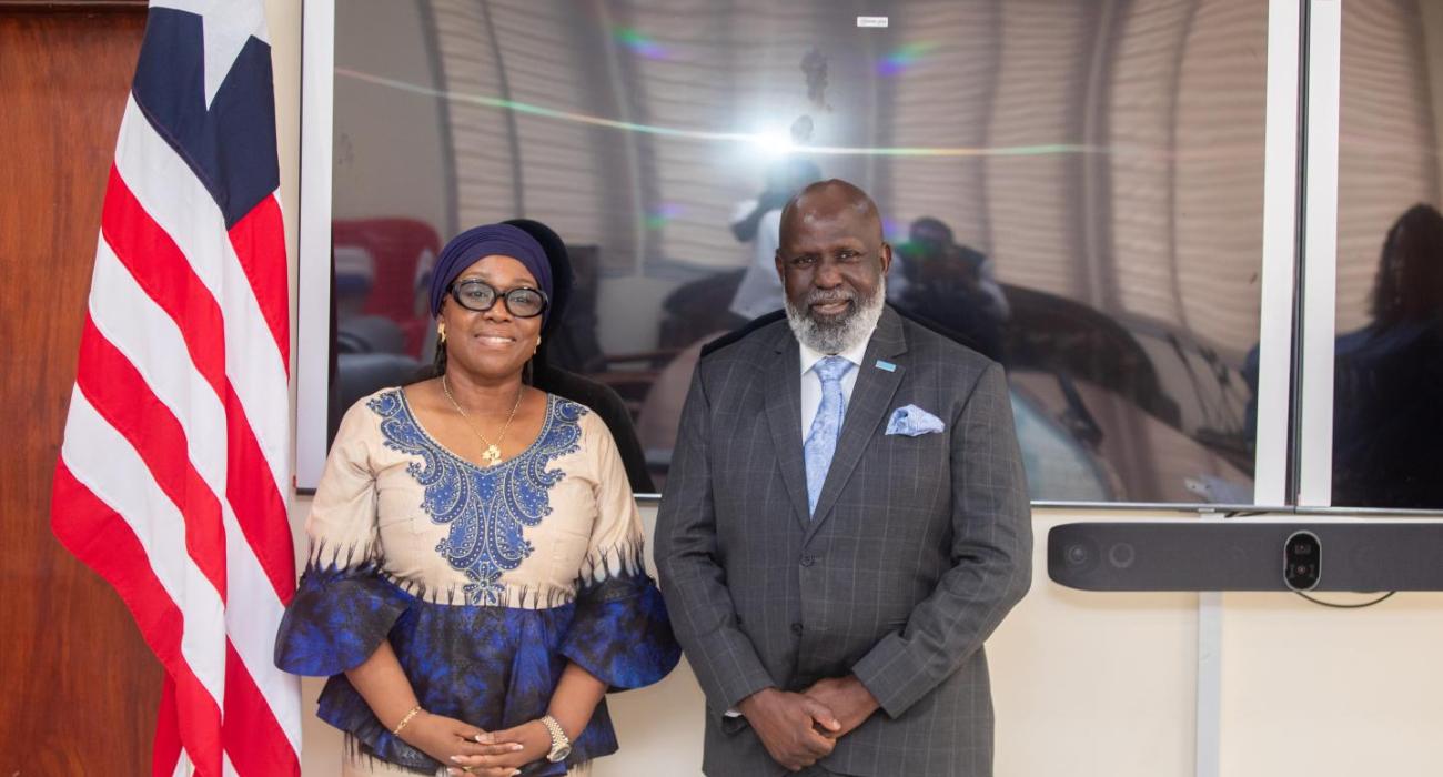 WHO Representative Dr Olushayo Olu with Liberia's Minister of Foreign Affairs H.E. Sara Beysolow Nyanti