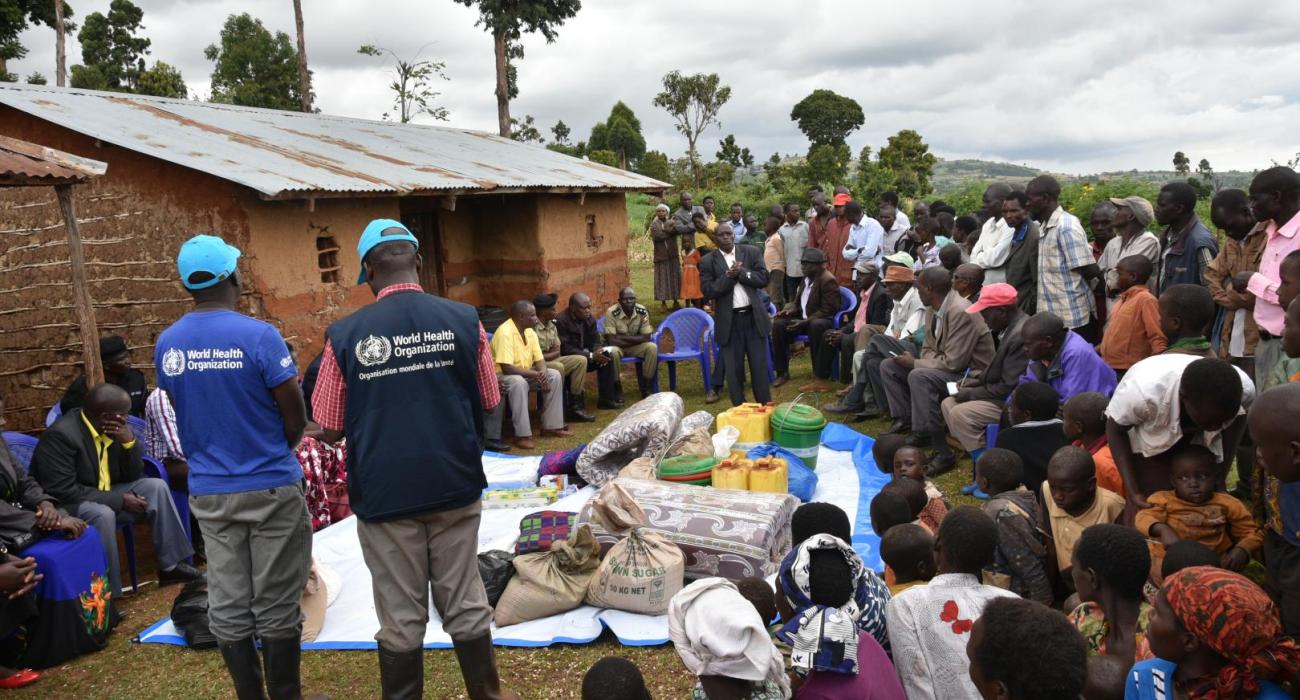 WHO Staff members conducting a community engagement activity during the Marburg Virus Disease outbreak