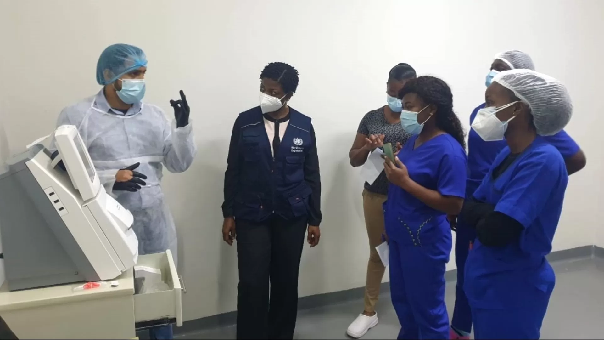 WHO Staff on a tour at the facility during the installation process