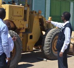  Dr Sagoe-Moses and Mr Shapumba at the site where the maternity waiting home will be constructed