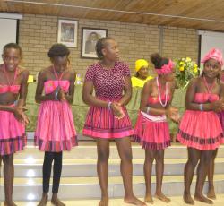 Learners from the David Bezuidenhout High School performing a traditional dance at the public lecture on World Mental Health Day