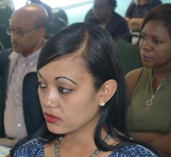 Letisia from UNFPA listening attentively to the presentations on mental health