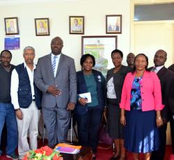 WHO Representative, Dr Yonas Tegegn his staff, and the Kabarole District Chairperson at his office. The Chairperson committed to supporting the preparedness to ensure that the people are kept safe from Ebola.