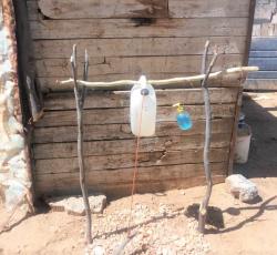 Hand-washing stations are being constructed in informal settlements with the help of community health workers and civil society organizations 