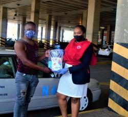 Special outreach to taxi drivers distributing masks, hand sanitizers and leaflets on COVID-19