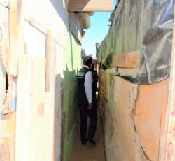 Dr. Sagoe-Moses at one of the informal settlements in Walvisbay.  This settlements had reported some of the highest number of new COVID-19 cases in the past
