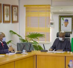 WR (Left) with the Honorable Minister of Federal Capital Territory Mohammed Musa Bello