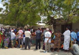 Community Health Officer delivering health education on cholera in one of the affected communities.