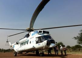 In Mingkaman, the “EWARS in a box” kits arrive by UN helicopter. Due to poor road conditions access to more remote areas or those in conflict is only possible by air, especially during the rainy season