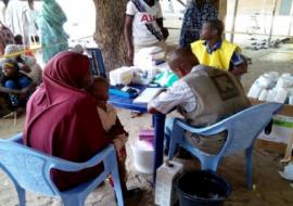 IRC Health officer been assisted by a community volunteer at Goni Kachallari community where Integrated PHC services are provided IRC