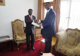 Honorable Minister of Foreign Affairs and International Cooperation, Mr Ephraim Chiume (left) receiving Dr. Eugene Nyarko’s credential at the Minister’s Office, Capital Hill
