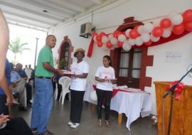 Dr. Atsyor awards one of the regular blood donors