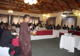 One of the External reviewers, Dr Buhle Ncube presenting the findings of the review during a high level meeting at Mountain Inn.