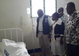 WHO Representative visiting one of the Cholera patients in one of the CTCs in Butiama District Council