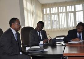 l-r: Dr. Kesetebirhan Admasu, Dr. Pierre M’Pele, Dr. Kebede Worku, as Dr. M’Pele speaks at the WHO DTA welcoming ceremony, MoH, 19 August 2013.