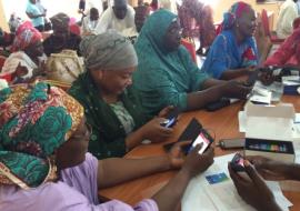 Health workers practicing real time reporting during EWARS in Borno