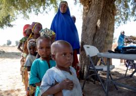 Children queuing for meningitis vaccination