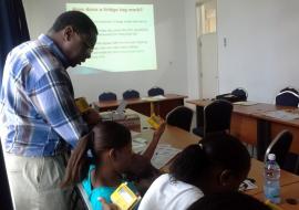 WHO Consultant, Dr Chindedza trains EPI nurses on the use of the Fridge Tag for vaccine temperature monitorin