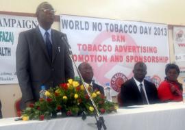 (L-R) The Hon. Minister of Health, Dr. Joseph Kasonde giving a statement to mark the WNTD at Nakatindi Hall in Lusaka, the WHO Representative, Dr. Olusegun Babaniyi , Dean, University of Zambia School of Medicine, Dr. Fastone Goma, and Mrs Brenda Chitindi, from the Tobacco Free Association of Zambia