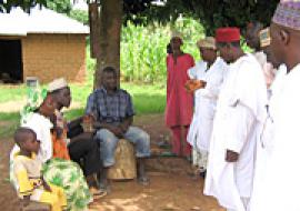 Gbata Village Health Committee members promoting immunization services