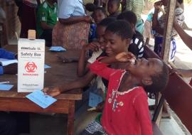A young child taking in the Oral Cholera Vaccine during the first dose campaign in Chikwawa
