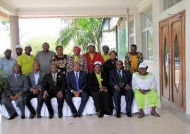 The Guest of Honour, the Minister for Health and Social Welfare, Hon. Dr. Hussein Mwinyi, in a group photo with members from the high table and members of the Parliamentary Social Services Committee