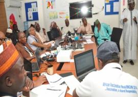 Dr Sule Meleh briefing the external surveilance review team at Borno Polio EOC