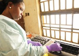 Yemisi Ighodalo, a lab technician at work in the EMLAB mobile laboratory in Freetown, Sierra Leone