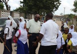 WHO Representative, Dr. Rufaro Chatora, interacting with the school children from affected communities to gauge awareness on cholera prevention measures.