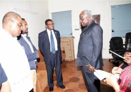 President Koroma, left, at the EOC working station being briefed by Dr Mufunda, WHO Representative