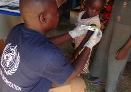 A nutritionist does MUAC screening as part of the organisation’s contribution to mark the UN Day