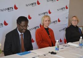 WHO Representative to Namibia, Dr Charles Sagoe-Moses (left), speaking at the event; alongside Dr Britta Lohrke from Ministry of Health and Social Services (middle)