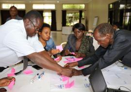 Participants documenting key events of the outbreak response in a group session