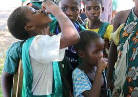 School children receive the oral cholera vaccine in Karonga.