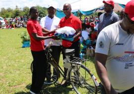 The Honorable Minister of Health Honorable Atupele Muluzi, MP handed over bicylces, World TB Day T-Shirts and cloth to members of best performing Community Sputum Collection Centres in Salima