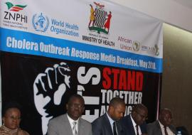 The Minister of Health, Dr. Chitalu Chilufya (4th from left) in the company of the two ministers and the WHO Representative at the media briefing