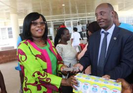 WHO Representative Dr. Alex Gasasira handing over key of the ambulance and BB lotions to the Hon. Minister of Health Dr. Wilhelmina Jallah