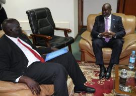 Dr Olu presenting his letter of credentials to Honorable Deng Dau Deng Malek. Photo: WHO