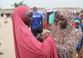 Health Worker administering Oral Cholera Vaccine to people in the Maiduguri Metropolitan Council, Maiduguri. Health Worker administering Oral Cholera Vaccine to people in the Maiduguri Metropolitan Council, Maiduguri.