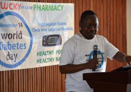 Dr. Moses K. Jeuronlon, DPC Cluster Lead, reading the WHO Regional Director for Africa WDD message during the indoor program in Monrovia Dr. Moses K. Jeuronlon, DPC Cluster Lead, reading the WHO Regional Director for Africa WDD message during the indoor program in Monrovia