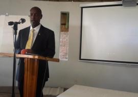 WHO Representative for Zimbabwe, Dr Alex Gasasira presenting his remarks at the stakeholders meeting