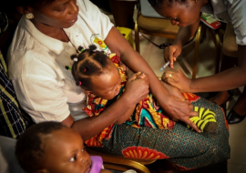 Susana and Abigail are first to be vaccinated with the malaria vaccine in Ghana pilot. Credit: WHO/Fanjan Combrink Susana and Abigail are first to be vaccinated with the malaria vaccine in Ghana pilot. Credit: WHO/Fanjan Combrink