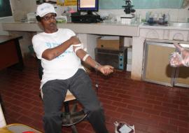 WHO Rep. voluntarily donating blood demostrates his leadersip role in health to saving lives