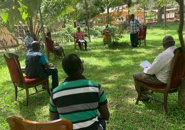 A WHO officer conducting COVID-19 community engagement 