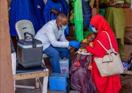 Eligible child being vaccinated Eligible child being vaccinated