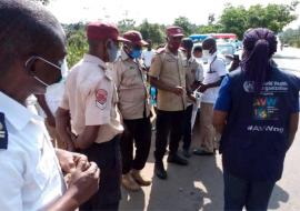 WHO and Ogun State Port Health Service staff address officers of the Federal Road Safety Corps on COVID-19 safety measures at the Idiroko border area in Ogun State. They also hand out protective materials including sanitisers and face masks/ WHO Nigeria WHO and Ogun State Port Health Service staff address officers of the Federal Road Safety Corps on COVID-19 safety measures at the Idiroko border area in Ogun State. They also hand out protective materials including sanitisers and face masks/ WHO Nigeria