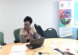 Ms Ndilimeke Mutikisha proving online training to surveillance officers on COVID-19