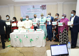 Cross section of participants with the Minister of Health Drs Osagie Ehanire and Edwin Isotu at the launch of the Food Safety Training Manual in Abuja