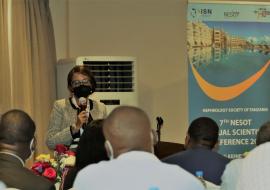 Dr. Tigest delivering remarks during the NESOT 7th Annual Scientific Conference