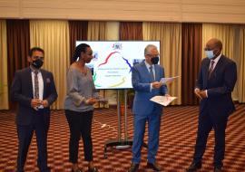 Hon. Prime Minister of Mauritius, P.K. Jugnauth handing over a copy of the national survey report on people who use drugs to the WHO Representative, Dr L. Musango in the presence of UNRC,  H. E. Mrs C. Umutoni and the Coordinator, National Drug Secretariat, Dr S. Appadoo